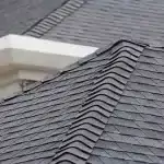 An image of an asphalt shingle roof, representing sustainable roofing.